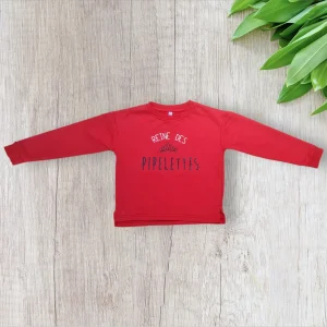 Pull fille 6 ans Districenter–Rouge– « Reine des pipelettes »
